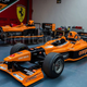 Illustration for article titled Roll Up To The Club With Your Two Best Friends In This Three-Seat Formula One Car